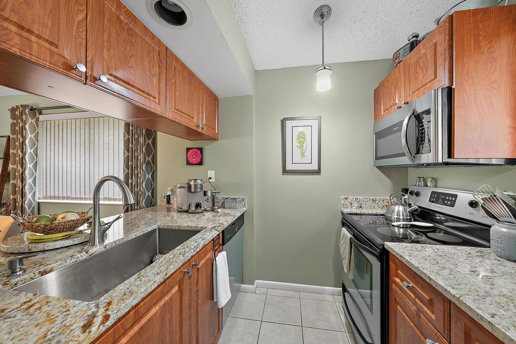 Photo of 835 Club Drive, Palm Beach Gardens, FL 33418 (MLS # R11074793)