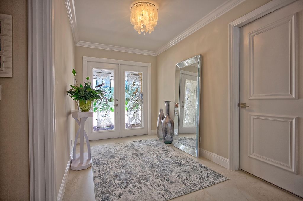 Photo of 455 S Country Club Drive, Atlantis, FL 33462 (MLS # R11161456)