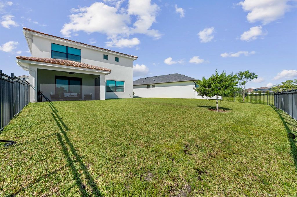Photo of 1838 Wandering Willow Way, Loxahatchee, FL 33470 (MLS # F10520942)
