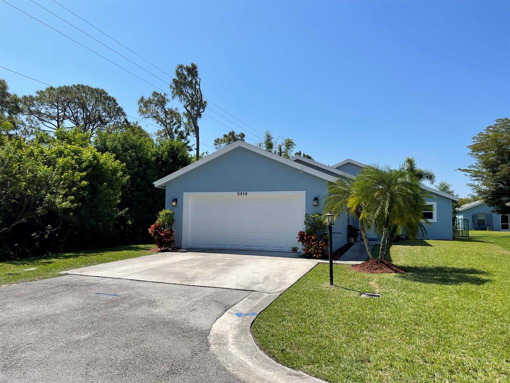 Photo of 2414 SW Regency Road, Stuart, FL 34997 (MLS # R10818750)