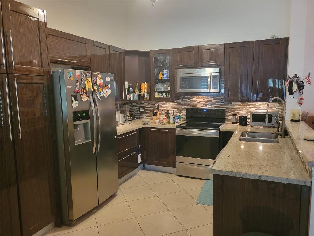 Photo of 13851 Oneida Drive #D2, Delray Beach, FL 33446 (MLS # B26033006)