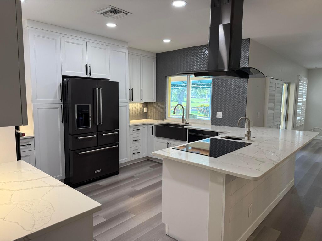 Photo of 26 SE Turtle Creek Drive, Jupiter, FL 33469 (MLS # B26019408)