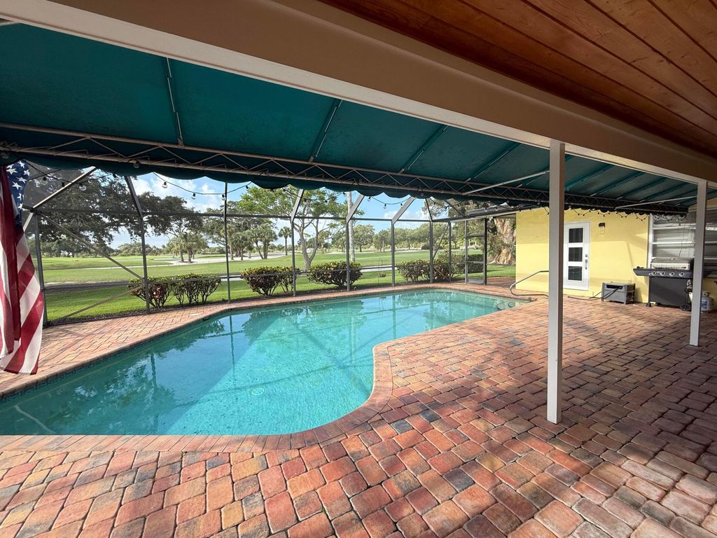 Photo of 26 SE Turtle Creek Drive, Jupiter, FL 33469 (MLS # B26019408)