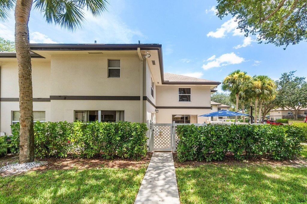 Photo of 33 Clinton Court #C, Royal Palm Beach, FL 33411 (MLS # R11118884)