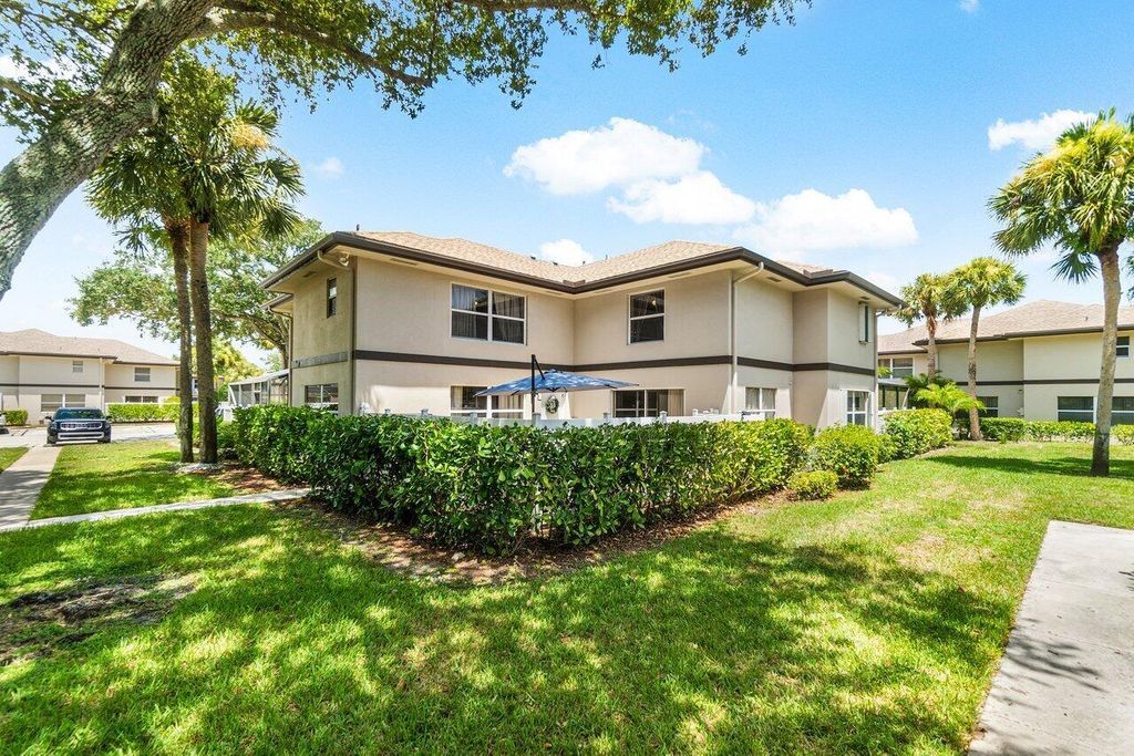 Photo of 33 Clinton Court #C, Royal Palm Beach, FL 33411 (MLS # R11118884)