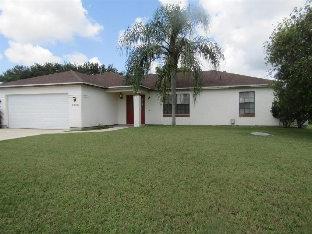Photo of 2340 SE Charleston Drive, Port Saint Lucie, FL 34952 (MLS # R10743476)