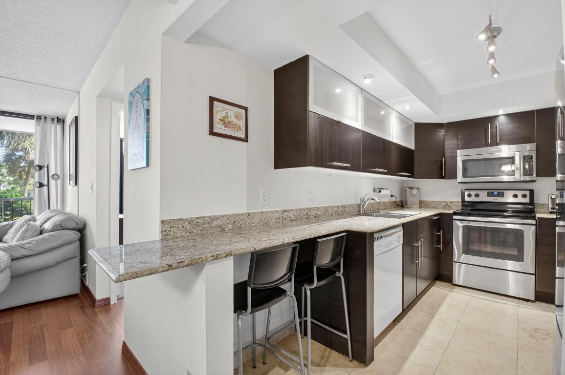 WILLOW WOOD MIDRISE CONDO - Residential Lease