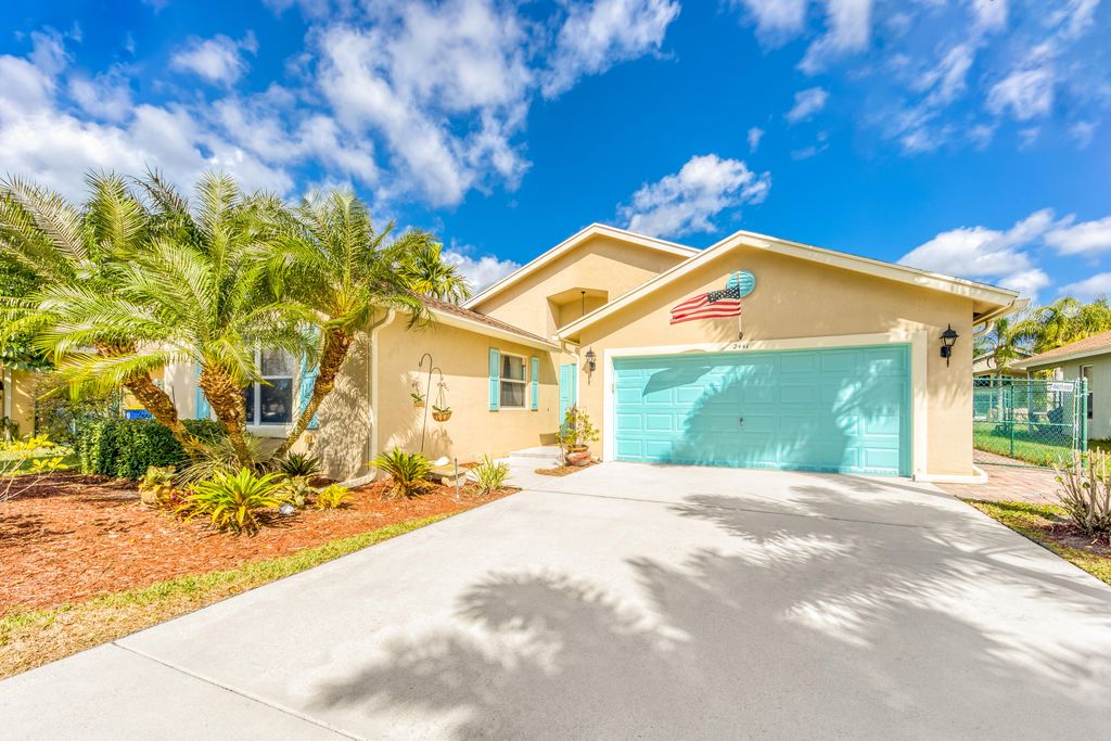 Photo of 2441 SW Omega Way, Stuart, FL 34997 (MLS # R10778102)