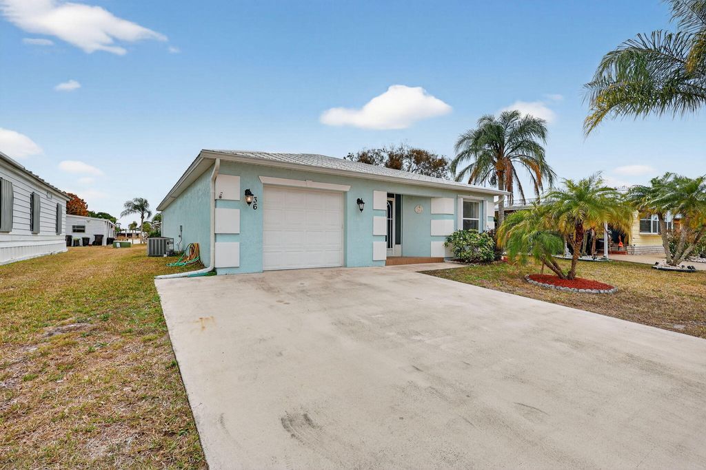Photo of 36 Ipanema Way, Fort Pierce, FL 34951 (MLS # R11163031)