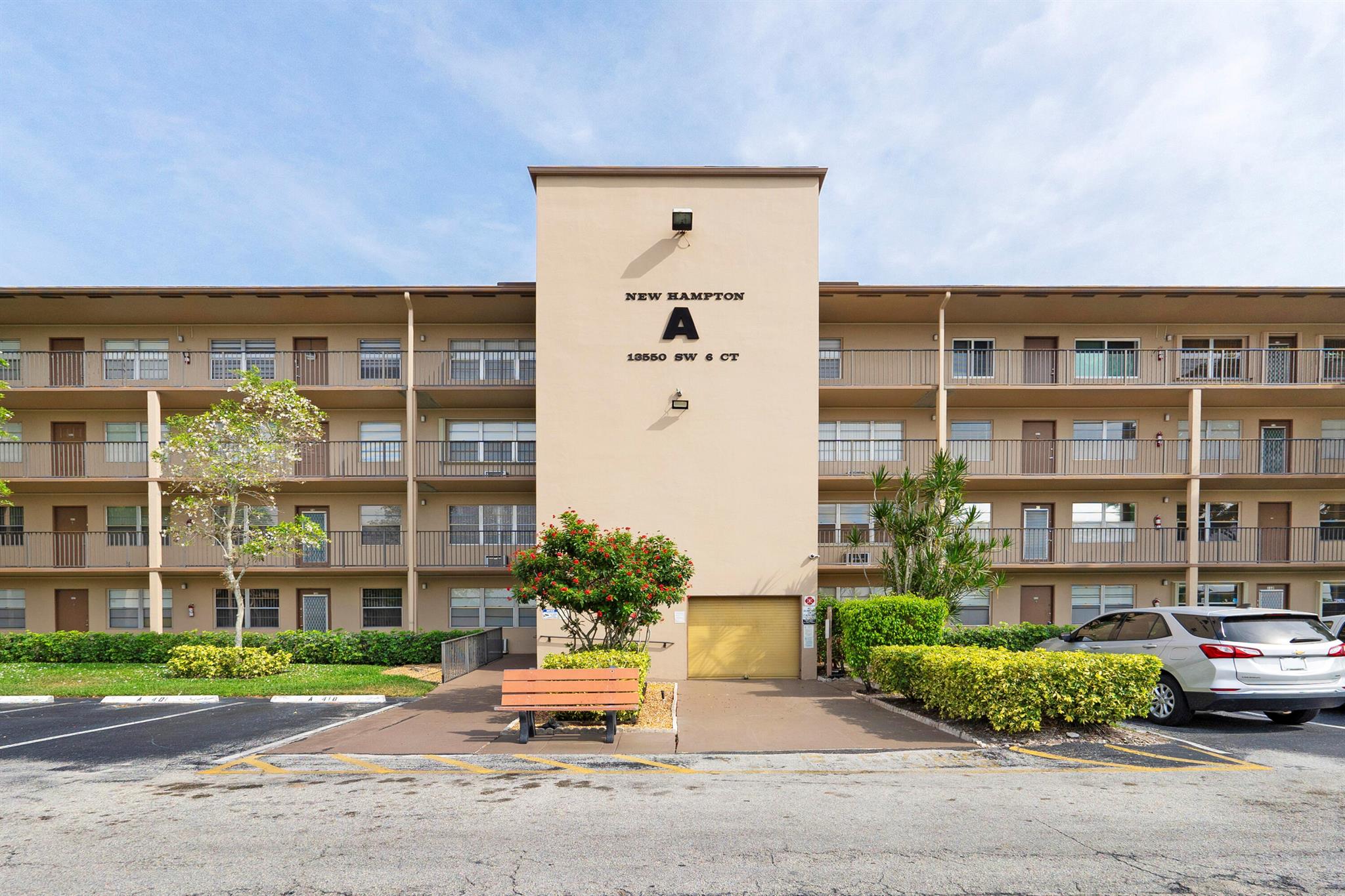 Discover this delightful ground-floor unit located in the prestigious New Hampton at Century Village. The unit boasts of ceramic tile floors, an upgraded kitchen with stainless steel appliances, and 2 bedrooms with spacious walk-in closets. New AC unit was installed in April 2021. Nestled in an exclusive 55+ community in Pembroke Pines, this property offers unparalleled privacy and resort-style living with many amenities. The pool is right across from your unit! The association includes cable, water, trash, sewer and much more! The serenity of the golf course and lake-view from the screened-in patio offer a peaceful retreat. This unit is a true treasure for homeowners and investors. It can be rented right away. This is the best location in Pembroke Pines.