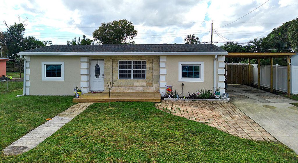 Photo of 3890 Ocala Road, Lake Worth, FL 33462 (MLS # R11151497)