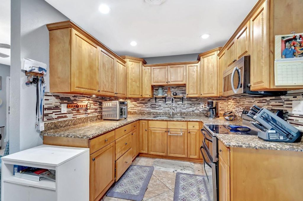 Photo of 3890 Ocala Road, Lake Worth, FL 33462 (MLS # R11151497)