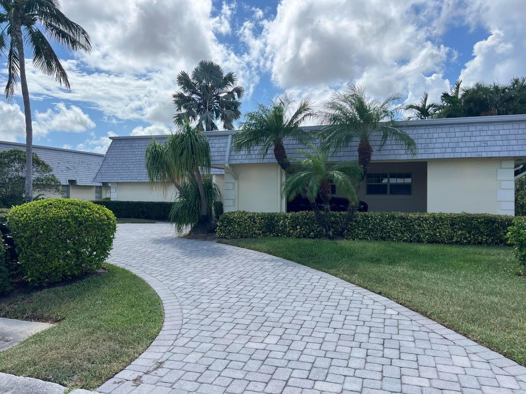 Photo of 371 Villa Drive S, Atlantis, FL 33462 (MLS # R10994688)