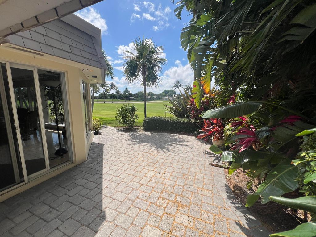 Photo of 371 Villa Drive S, Atlantis, FL 33462 (MLS # R10994688)