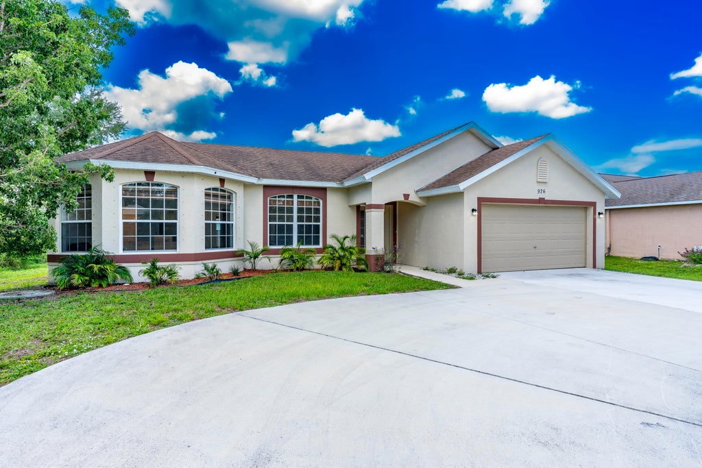 Photo of 926 SW Nichols Terrace, Port Saint Lucie, FL 34953 (MLS # R11111886)