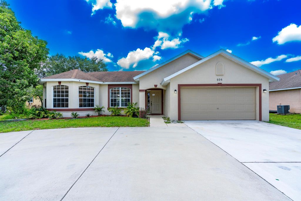 Photo of 926 SW Nichols Terrace, Port Saint Lucie, FL 34953 (MLS # R11111886)