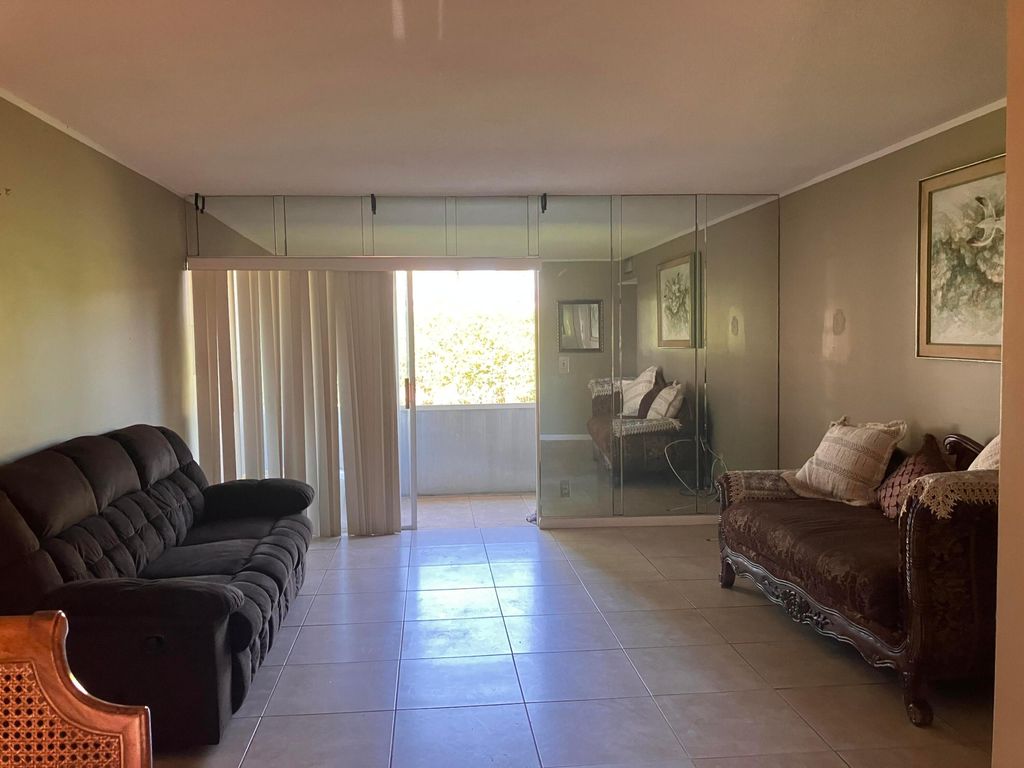 Photo of 17 Golfs Edge #D, West Palm Beach, FL 33417 (MLS # B26006525)
