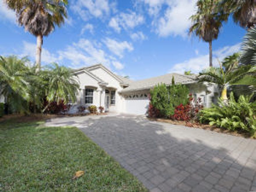 This 2 bed +Den and 2 bath home with hardwood floors throughout, granite counter-tops in the kitchen and upgraded pull out drawers.  It has an extended 2.5 car garage with Central Air Conditioner.  The large sliding doors lead to the screened in heated pool/spa with waterfall. New pool heater installed 2015. Backs up to a Preserve.  Hurricane shutters throughout. Home is located in a non-membership community, Jensen Beach Golf and Country Club which features 2 club houses.  One with a golf pro shop and restaurant, the second showcases a community pool heated year round and a second pool located close to NW Golden Oak Trail, 6 tennis courts, and facilities for private parties. Eagle Marsh Golf Club is a public golf course located inside Jensen Beach Country Club. Min.from Mall & Restaurants