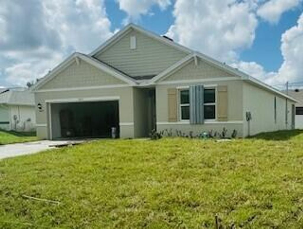 Photo of 4602 SW Bachelor Street, Port Saint Lucie, FL 34953 (MLS # R11001116)