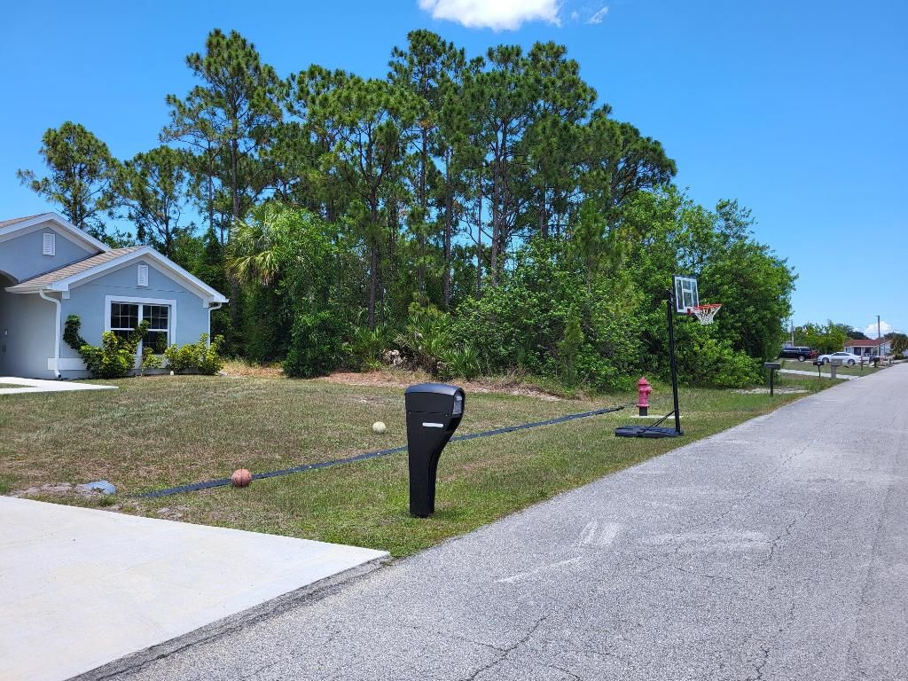 Photo of 841 SW Paul Revere Terrace, Port Saint Lucie, FL 34953 (MLS # R10997286)