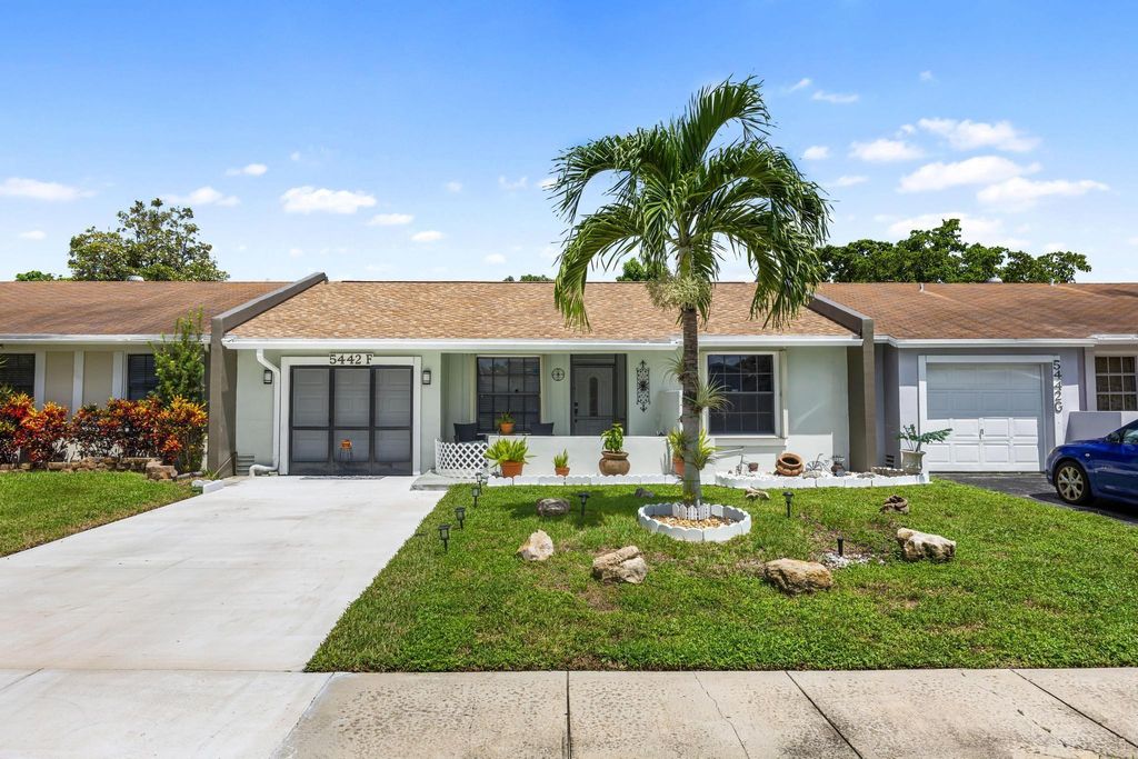 Photo of 5442 S Lakewood Cir #F, Pompano Beach, FL 33063 (MLS # F10526286)