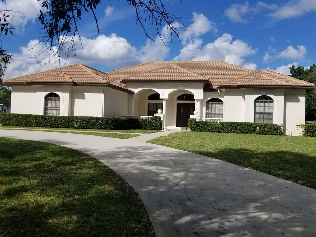 Photo of 8709 Man O War Road, Palm Beach Gardens, FL 33418 (MLS # R11153503)