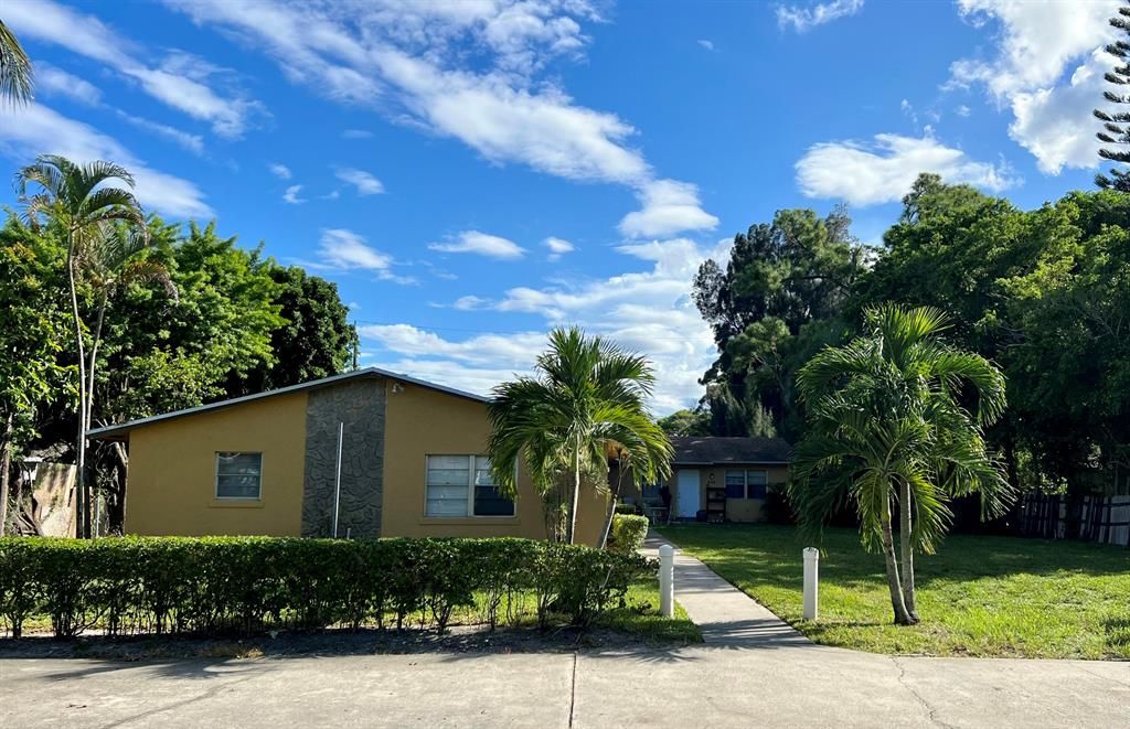 Photo of 4032 Luzon Avenue Ave, Lake Worth Beach, FL 33461 (MLS # R10833955)
