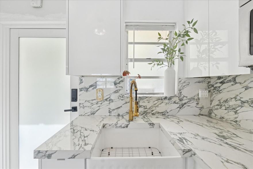 Tastefully remodeled boutique condo just blocks from the beach, restaurants and nightlife. This bright and well-maintained residence features ceramic tile floors, central air conditioning, updated bathroom and a luxurious kitchen with glossy cosmopolitan cabinets, carrara white marble countertops and a matching backsplash. The boutique building offers secure entry, on-site laundry, and a prime walkable location close to everything. Get ready to bring your bicycle or jog the SoBe boardwalk in the mornings. Will not last long!