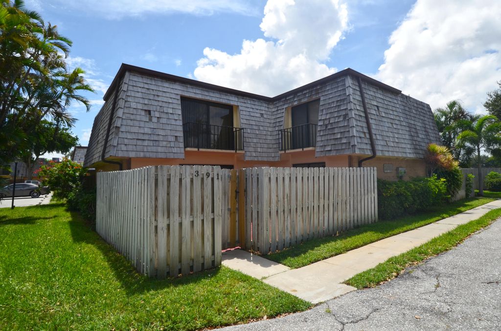 Photo of 391 Lake Arbor Drive, Palm Springs, FL 33461 (MLS # R11016201)