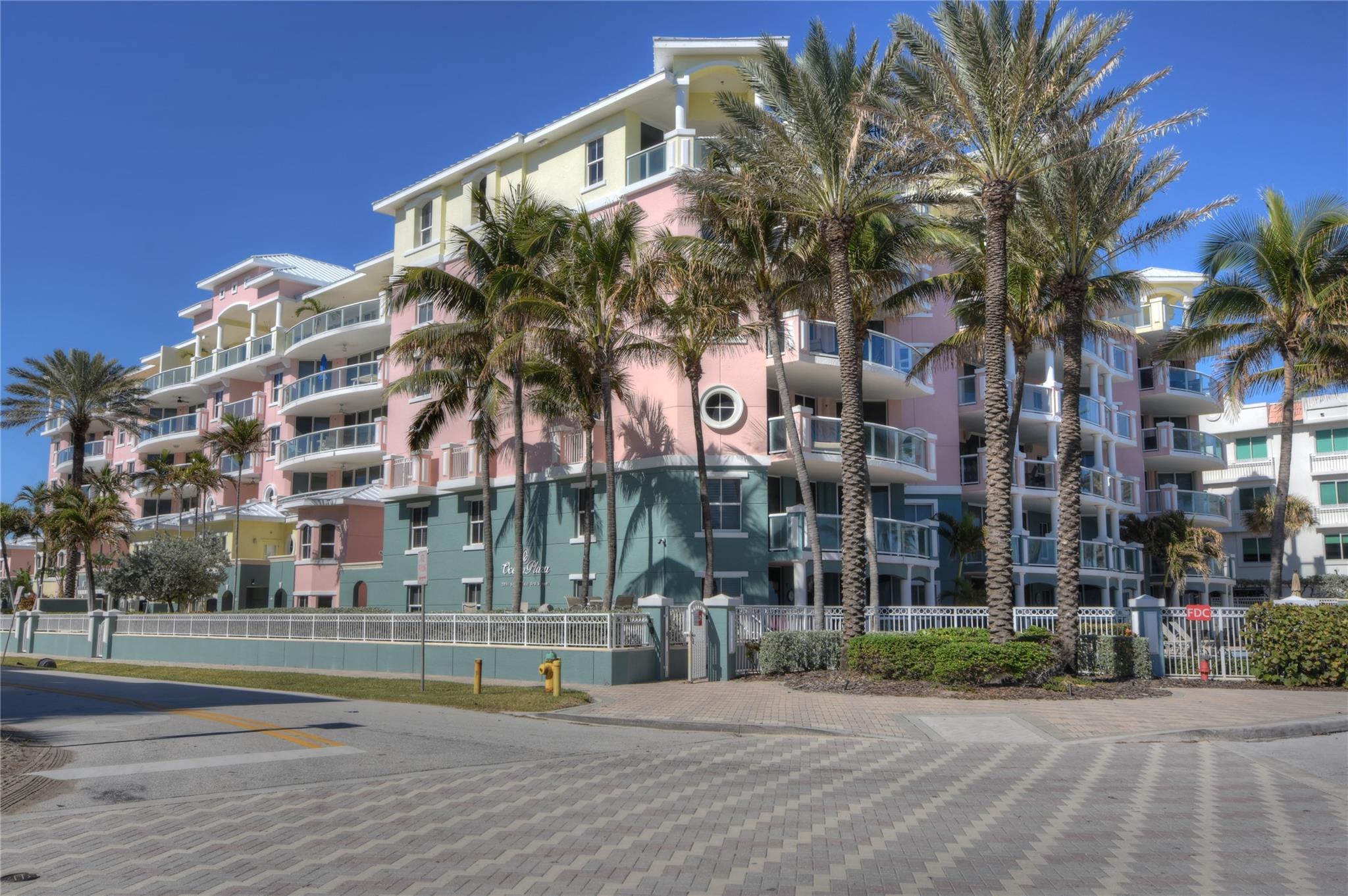 DIRECT OCEAN VIEW from Living Room, Dining Room and Master Bedroom. IMMACULATE SE corner 5th floor on thriving Deerfield Beach boardwalk. Walk to restaurants, shops and nightlife. 2 bedroom 2.5 bath 2193 sq ft in sought after OCEAN PLAZA.. amenities include: 2 underground assigned parking spaces, oceanfront gym w/ sauna, pool/jacuzzi, social room and 24 hour Concierge. Stack elevator opens directly into your condo to either main area or laundry room. Custom blinds and custom cabinetry in Living, Dining and Bedrooms. Available for 2026 season or annual lease at $7500 per month. Listing agent must accompany all showings