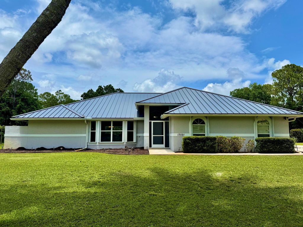 Photo of 13021 150 Court N, Jupiter, FL 33478 (MLS # R11099216)