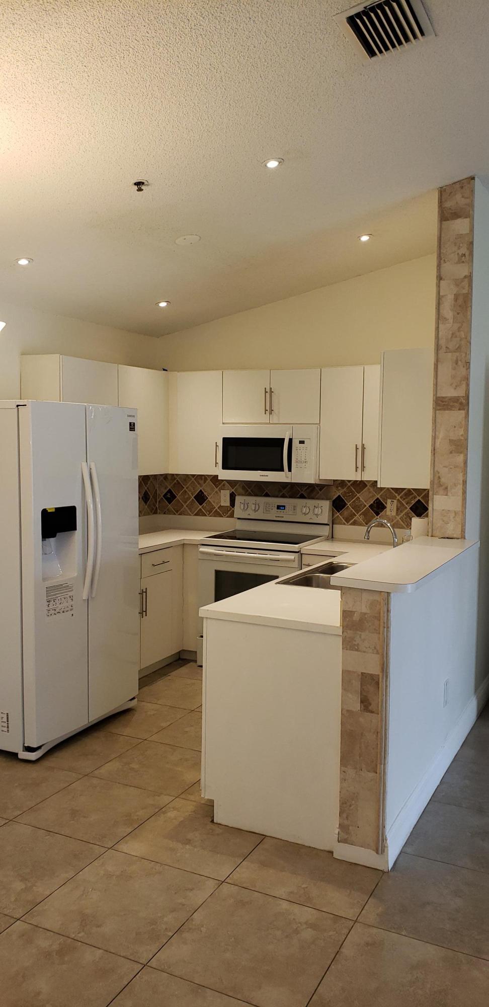 Bright, airy corner unit with vaulted ceiling. Tile throughout. Ceiling fans, LED lights, modern vanity area, walk-in closet in master. Club Caribe boasts a huge, beautiful pool area with jacuzzi, along with gym and tennis courts. Very convenient to everything and very well maintained.Minimum Credit Score 600.