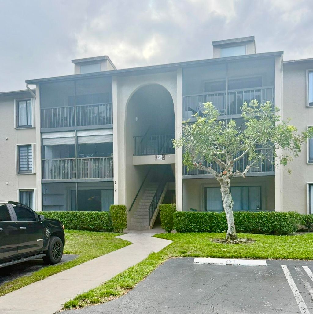 Photo of 712 Sunny Pine Way #E3, Greenacres, FL 33415 (MLS # B26030522)