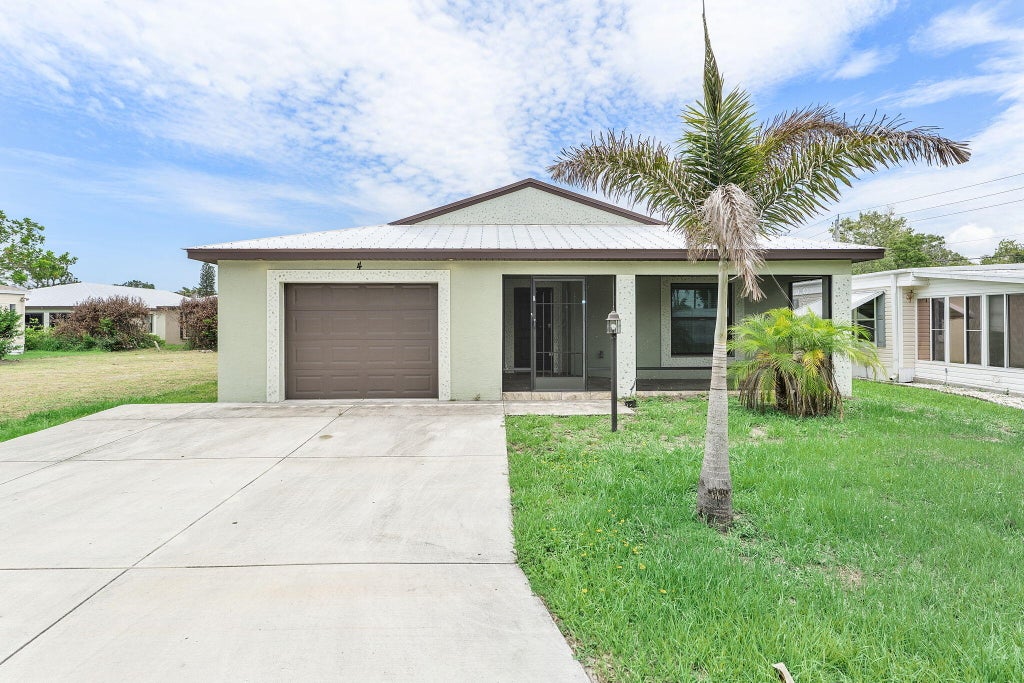 Photo of 4 S Alhambra LN S, Port Saint Lucie, FL 34952 (MLS # B26038877)