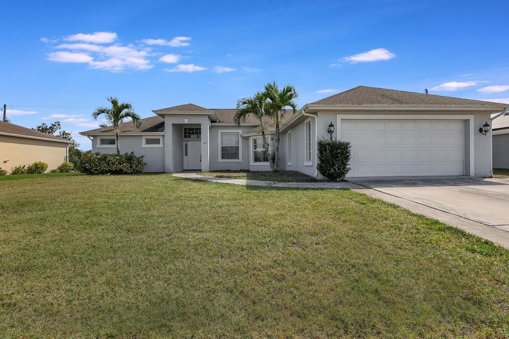Photo of 638 SW Hamberland Avenue, Port Saint Lucie, FL 34953 (MLS # R10970229)