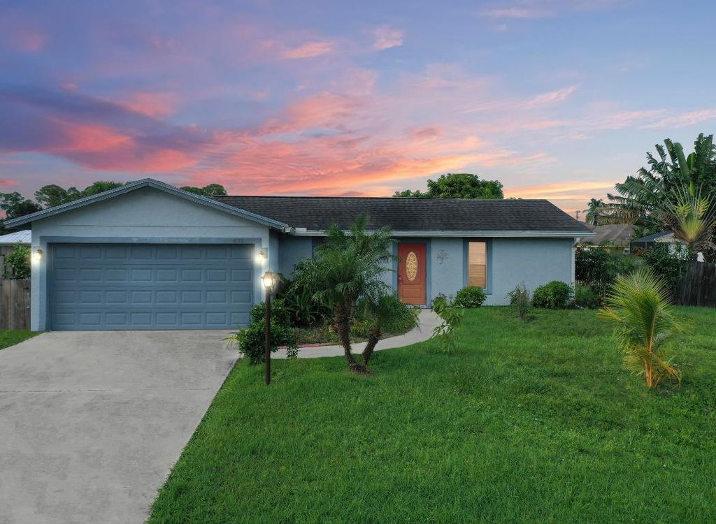 Photo of 571 SE Karrigan Terrace, Port Saint Lucie, FL 34953 (MLS # R10929181)