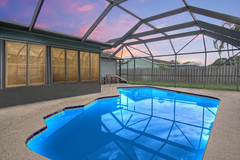 Photo of 571 SE Karrigan Terrace, Port Saint Lucie, FL 34953 (MLS # R10929181)