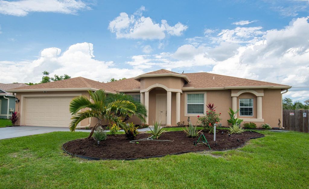 Photo of 1585 SW Merchant Lane, Port St Lucie, FL 34953 (MLS # R10895755)