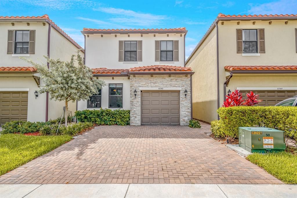 Photo of 5048 Laurel Oak Drive, Palm Beach Gardens, FL 33410 (MLS # R10725671)