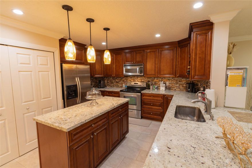 Move-in ready, fully furnished 3-bedroom, 2.5-bath townhouse in a great Sunrise neighborhood. Features a modern open kitchen with stainless steel appliances, spacious living and dining areas, and a full-size washer & dryer. Upstairs, all bedrooms have queen beds and ample closet space a tv and dresser. Enjoy a private patio, included parking, and community pool. Conveniently located near Sawgrass Mills Mall, FLA Live Arena, Publix, and major highways (Sawgrass Expressway & I-75). Perfect for commuters and those who love convenience.
