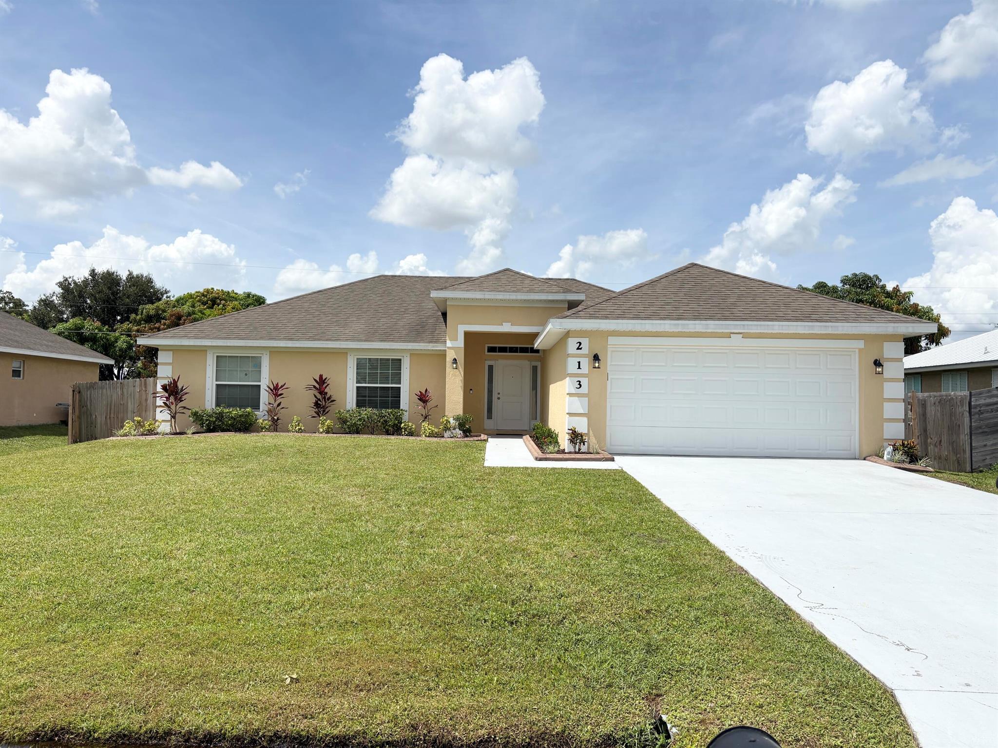 Really cute and clean 4/2/2 with a big fenced in yard. Open floor plan, tile throughout, wood laminate in some of the bedrooms. Does not have a washer/dryer. Available right away!