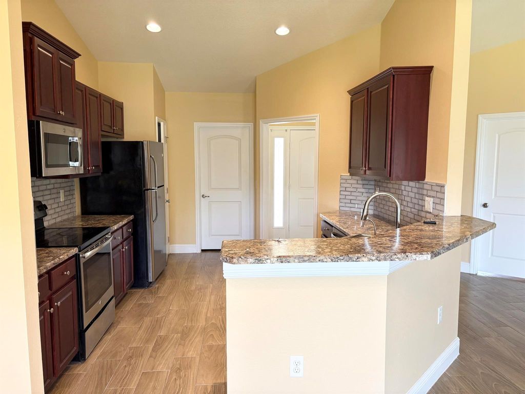 Photo of 213 SW Starfish Avenue, Port Saint Lucie, FL 34983 (MLS # R11119635)