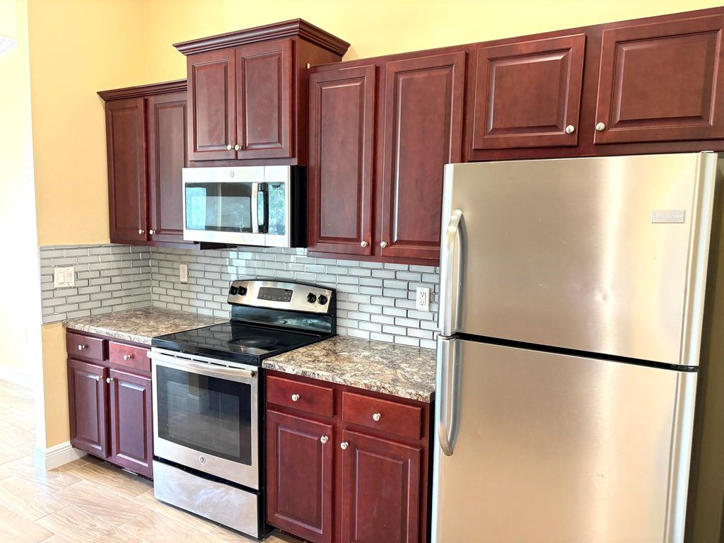 Photo of 213 SW Starfish Avenue, Port Saint Lucie, FL 34983 (MLS # R11119635)