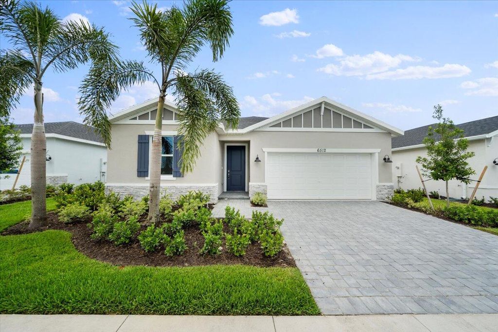 Photo of 6512 NW Cloverdale Avenue, Port Saint Lucie, FL 34987 (MLS # R10992006)
