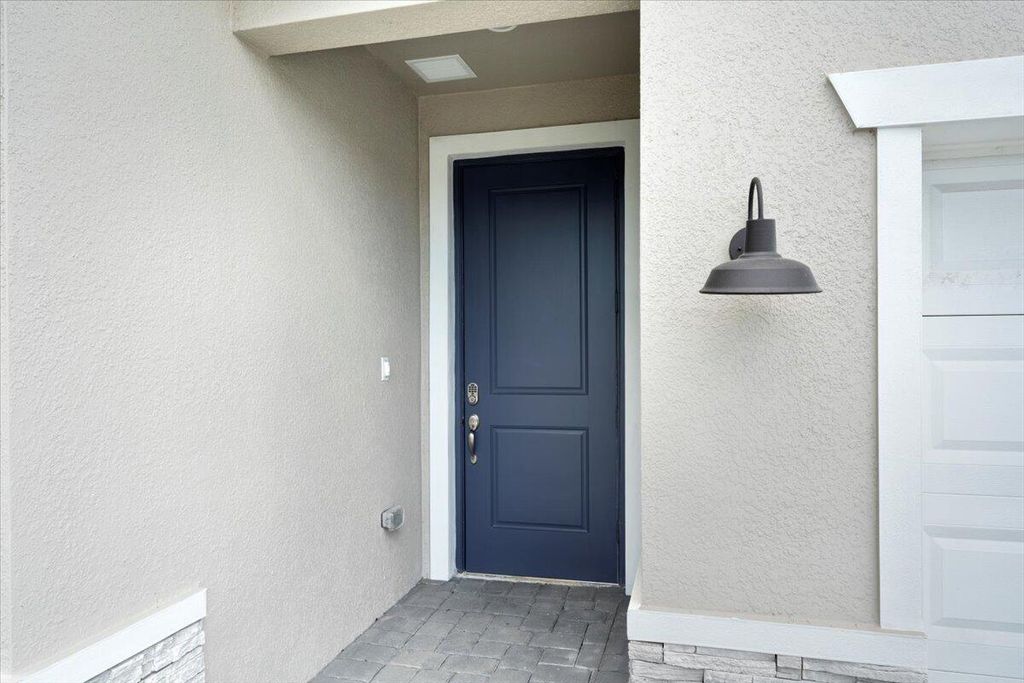 Photo of 6512 NW Cloverdale Avenue, Port Saint Lucie, FL 34987 (MLS # R10992006)