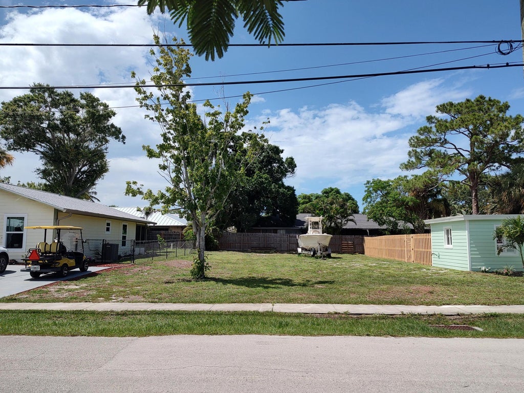 Photo of 667 NE Alice Street, Jensen Beach, FL 34957 (MLS # R11102529)