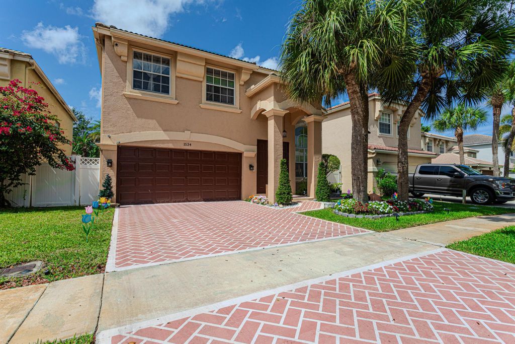 Photo of 1534 Running Oak Lane, Royal Palm Beach, FL 33411 (MLS # R11133613)