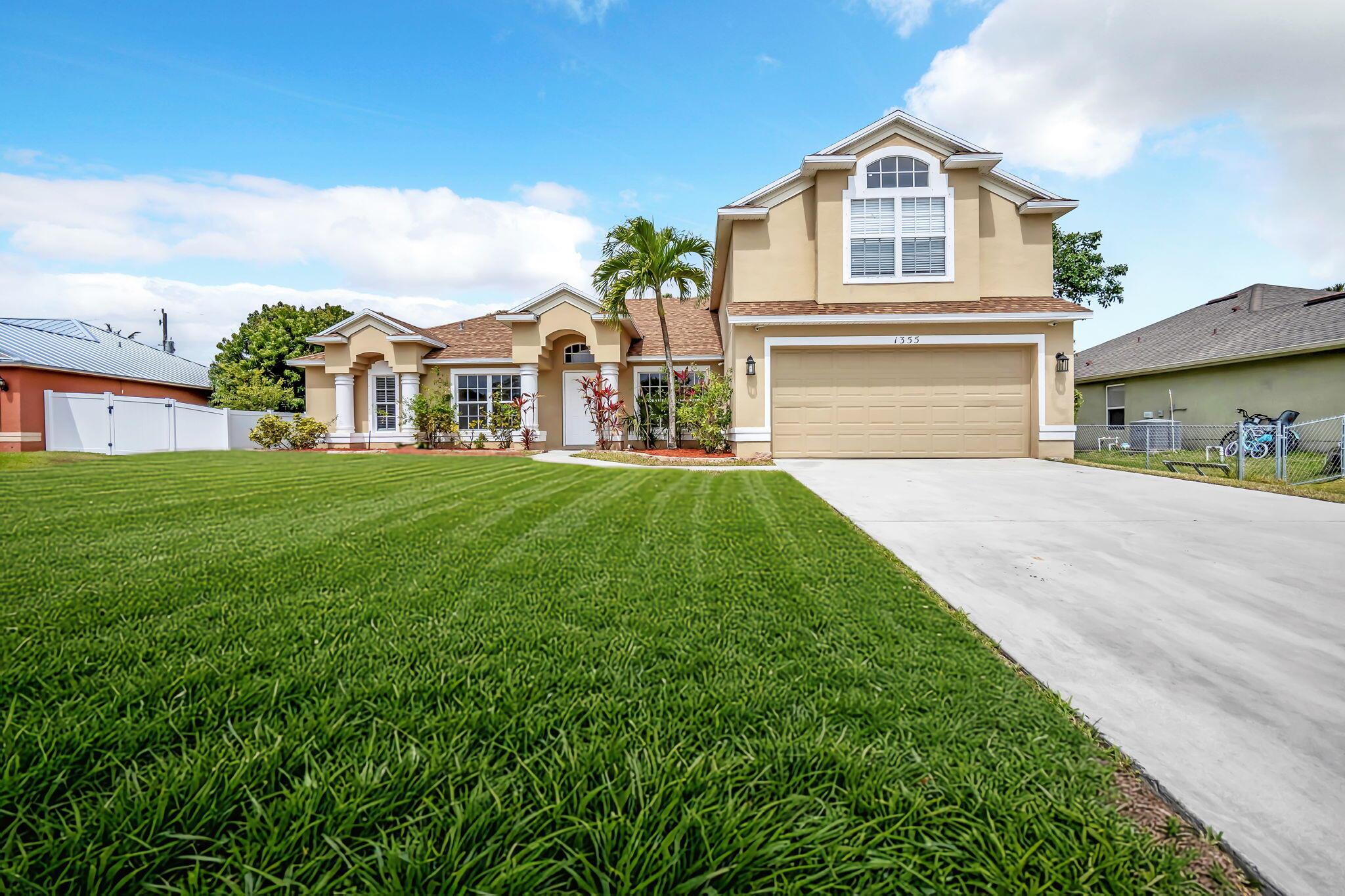 Welcome home to the epitome of PSL. Situated on a beautiful, quiet street, this home boasts 5 bedrooms and 3 bathrooms, with a huge open floor plan. NEW ROOF just installed this week, $25k spent ( with 25 year warranty). Huge lot. New floors in all bedrooms. In ground sprinkler system. In the heart of PSL, just off Gatlin Blvd. Priced to sell fast..don''t miss out! Second floor has a huge bedroom with gabled ceiling. Priced To Sell!