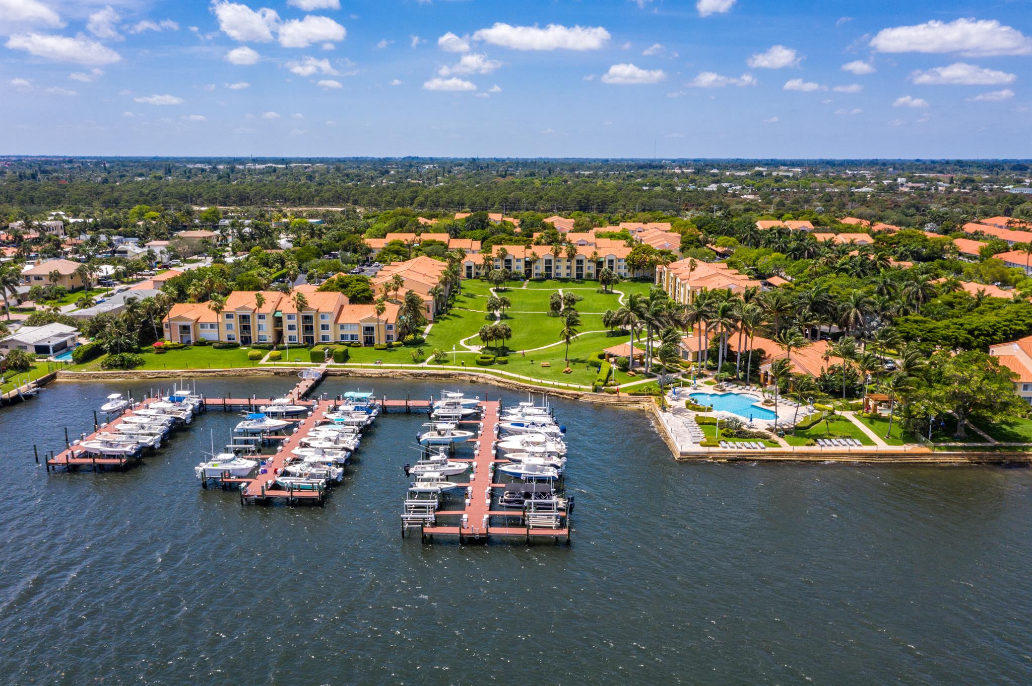 Welcome to your private oasis in a gated waterfront community. This fully renovated two-bedroom townhome offers a serene escape with its private entrance and stunning garden views. Step inside to discover white large porcelain tile and luxury vinyl flooring, creating a modern and elegant atmosphere. The kitchen boasts granite countertops, stainless Whirlpool appliances, and trendy backsplash, all complemented by white wood cabinetry with a soft closing feature. Both bathrooms feature expansive marble tiles, adding a touch of luxury to your daily routine.Available unfurnished for min 6 months or a 12 months lease immediately.
