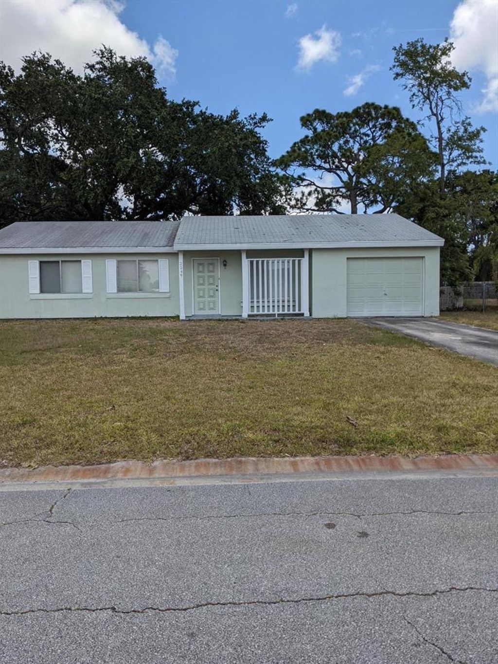 Photo of 2049 SE Triumph Road Rd, Port St Lucie, FL 34952 (MLS # R10719274)